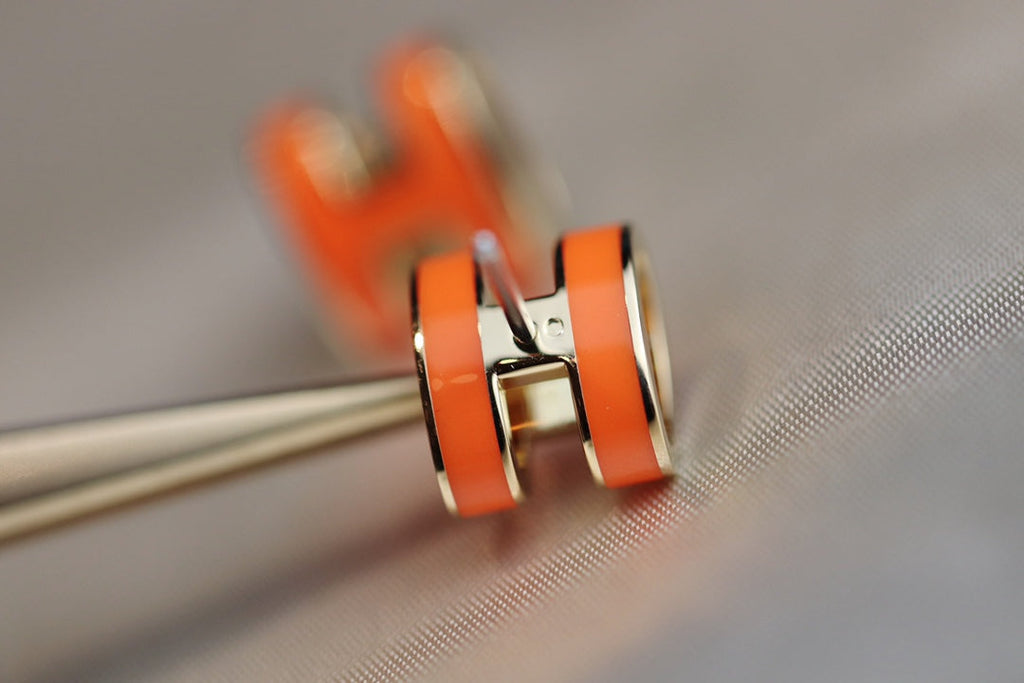 HERMES MINI POP H EARRINGS ORANGE
