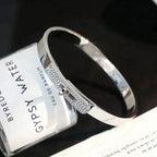 HERMES KELLY SILVER DIAMOND BRACELET