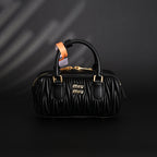 miu-miu-black-matelasse-leather-top-handle-bag Handle