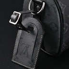 louis-vuitton-keepall-bandouliere-50-monogram-eclipse-canvas Handle
